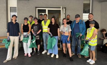 Besucher der Caritas-Wärmestube gemeinsam für ein sauberes Linz