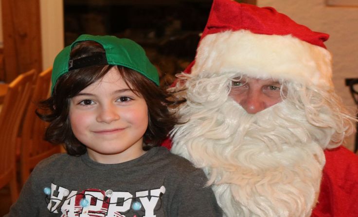 Weihnachtsmann „Charly“ mit dem jüngsten Gast Leo MarkFotos: KB Freistadt