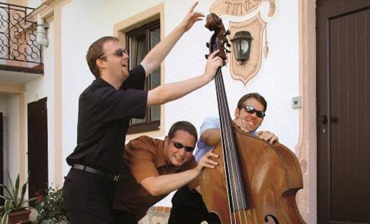 Ein historisches Foto des Obsession Trios aus dem Jahr 2003