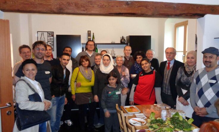 Ein Begegnungstreffen von Menschen unterschiedlicher Herkunft