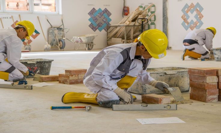Die Asylwerber zeigten bei den Maurerarbeiten vollen Einsatz. Foto: WKOÖ