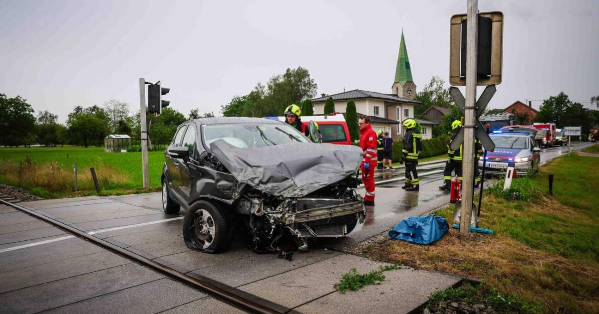 Car collided with a regional train of the Mattigtalbahn railway at a level ...