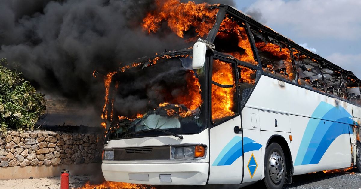 Tour bus catches fire while driving